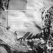 Tarradale Quarry, oblique aerial view, taken from the SW, centred on the cropmark of a possible enclosure.