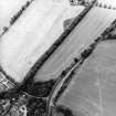 Oblique aerial view centred on the cropmarks, taken from the S.