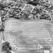 Charlestown, oblique aerial view, taken from the NW, centred on the cropmark of a ring-ditch.