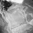 Oblique aerial view centred on the cropmarks of the possible quarries, pit-setting and rig with cropmarks adjacent, taken from the ESE.