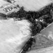 Allangrange, oblique aerial view, taken from the SE, centred on the cropmarks of a possible settlement. Allangrange House is visible in the centre right half of the photograph.