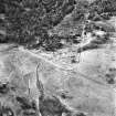 Dunachton Burn and Mill, oblique aerial view, taken fom the SE, centred on the remains of a small township, an area of rig, and traces of an unenclosed settlement beside the burn. The remains of Dunachton Burn mill are visible in the bottom left-hand corner of the photograph.