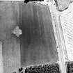 Brackley, oblique aerial view, taken from the E, centred on cropmark of a ring-ditch.