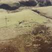 Oblique aerial view of Bairn's Hill centred on the remains of a farmhouse, farmsteading and township, taken from the NNE.