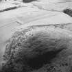 Oblique aerial view of Wheedlemont centred on the remains of a fort, taken from the NE.