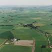 General oblique aerial view looking over the village of Clatt, taken from the W.