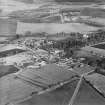 Oblique aerial view centred on the village, taken from the SSW.