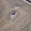 Oblique aerial view centred on the remains of the recumbent stone circle, taken from the SSW.