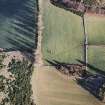 Oblique aerial view centred on the standing stone, taken from the WSW.