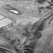 Oblique aerial view of Leuchar Moss centred on the remains of rig-and-furrow cultivation, taken from the NE.