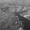 Oblique aerial view centred on the coastal battery with the harbour in the background, taken from the E.

