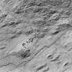 Oblique aerial view of Feadan centred on the remains of a farmstead, taken from the E.