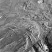 Oblique aerial view of Feall Bay centred on the remains of rig with a cairn and clearance cairns adjacent, taken from the ESE.