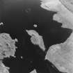 Oblique aerial view of Loch Cliad centred on a two crannogs, taken from the NNE.