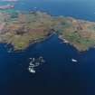 General oblique aerial view of Muck centred on Port Mor, taken from the SSE.