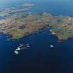 General oblique aerial view of Muck centred on Port Mor, taken from the SSE.