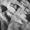 Oblique aerial view of the Carn-ban, taken from the north west, centred on the farmstead.