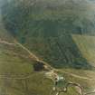 Oblique aerial view centred on the farmstead, taken from the SSE.