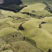 Oblique aerial view centred on the remains of the fort, taken from the ENE.