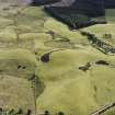 Oblique aerial view centred on the remains of the fort, taken from the NNE.