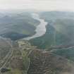 General oblique aerial view looking over the village of Dalwhinnie along Loch Ericht, taken from the NNE.