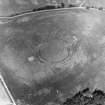 Drummondernoch, oblique aerial view, taken from the S, centred on the cropmarks of a fort.