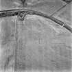 Comrie Castle, oblique aerial view, taken from the NE, centred on cropmarks including those of a possible enclosure.