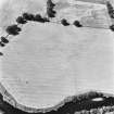 Strageath, oblique aerial view, taken from the E, showing linear cropmarks, part of the Annexe and a possible Roman road.