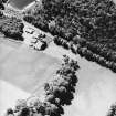 Bennybeg Craig, oblique aerial view, taken from the NE, centred on the cropmarks of a henge.