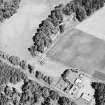 Bennybeg Craig, oblique aerial view, taken from the SW, centred on the cropmarks of a henge.