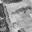 Bennybeg Craig, oblique aerial view, taken from the S, centred on the cropmarks of a henge.