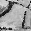 Lagg, oblique aerial view, taken from the NNW, centred on a complex of cropmarks which include a barrow, square barrow and pits.