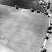 Oblique aerial view centred on the cropmarks of Roman quarry pits, taken from the ENE.