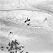 Milquhanzie Hill, oblique aerial view, taken from the N, centred on the snow-covered fort.