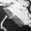 Tolvah, oblique aerial view, taken from the SW, centred on the remains of a township.