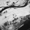 Bulroy, oblique aerial view, taken from the SE, centred on a farmstead and rig. Remains of a township are visible in the top half of the photograph.
