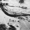 Bulroy, oblique aerial view, taken from the E, showing the remains of a township in the top half of the photograph, and rig in the bottom left-hand corner.