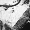 Tolvah, oblique aerial view, taken from the NW, showing the remains of a township in centre of the photograph.