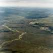 General oblique aerial view looking along Glen Feshie towards the Cairngorm mountains, taken from the WSW.