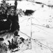 Oblique aerial view of the farmstead, farmsteading, and the the remains of the homestead, taken from the NNE.