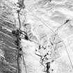 Oblique aerial view centred on the remains of rig with rig, sheepfold and field banks adjacent, taken from the NNE.