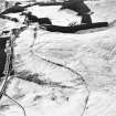 Oblique aerial view centred on the remains of the field system, taken from the NW.