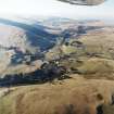 General oblique aerial view looking across the village, taken from the ESE.