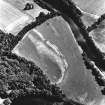 South Mains, Innerpeffray, oblique aerial view, taken from the WNW, centred on cropmarks including those of pits. Innerpeffray Castle is visible in the top left-hand corner of the photograph.