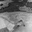 Fendoch, oblique aerial view, taken from the SSE, centred on cropmarks including those of a possible enclosure and a linear cropmark.