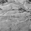 Glen Fender, oblique aerial view, taken from the SSE, centred on the footings of a farmstead and buildings. Remains of a township are visible in the centre right of the photograph.