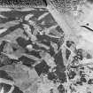 Glen Fender, oblique aerial view, taken from the W, centred on a hut-circle. The Crieff to Dalnacardoch military road is visible in the right half of the photograph.