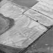 Oblique aerial view centred on the cropmarks of the Roman Temporary Camp, rig and palaeochanels, taken from the SSW.