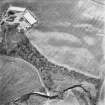 Leadketty, oblique aerial view, taken from the SE, centred on the cropmark of an enclosure. An alignment of pits running from it towards the top right-hand corner of the photograph is part of a large pit-defined enclosure.