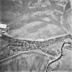 Leadketty, oblique aerial view, taken from the SSE, centred on the cropmarks of an enclosure, a possible enclosure, pits and parts of a pit-defined enclosure.